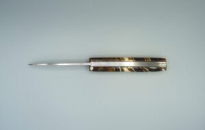 Herval lame damas manche molaire de mammmouth résine beige